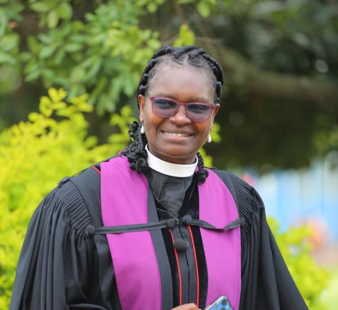 Rev. Dr. Josephine Mutuota in clerical robe and purple stole